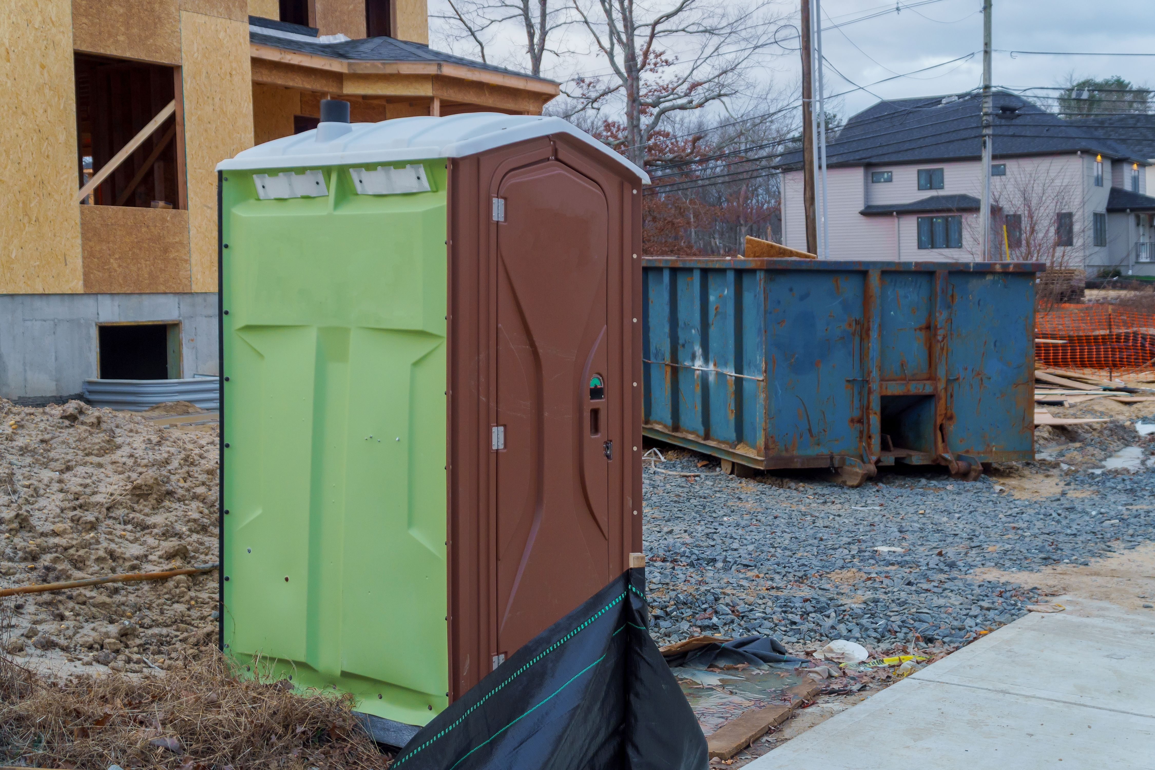 portable-restroom-on-a-dumpsters-being-full-with-g-2025-04-01-05-27-02-utc